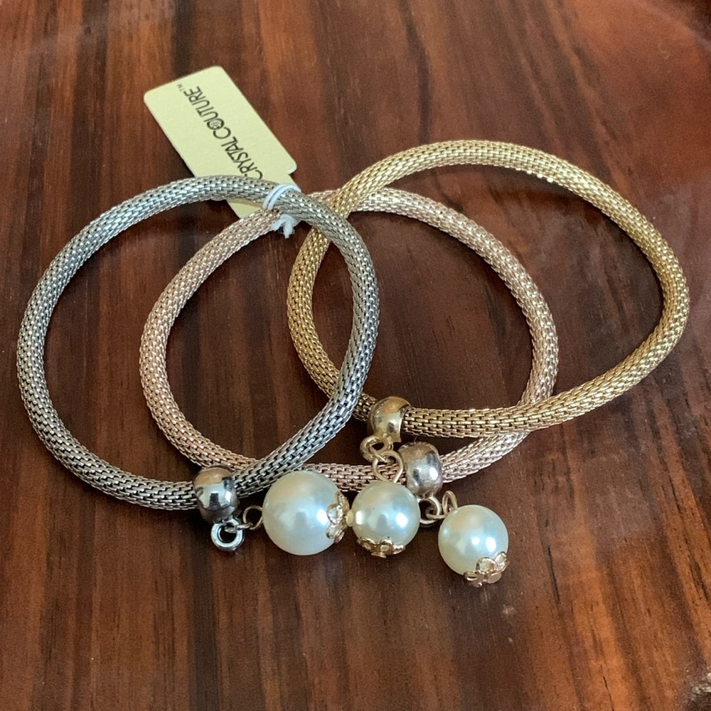NWT Crystal Couture silver, gold, and rose gold tone stretch bracelets